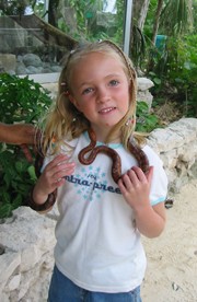 Playing with snakes at Crococun Zoo near Puerto Morelos.