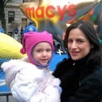 Family Fun along hte Thanksgiving Day Parade route in NYC