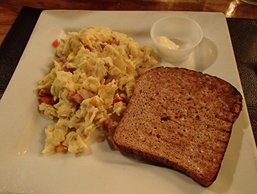 Filling egg scramble breakfast. Yes, that is a teaspoon of butter.